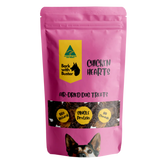 Pink package of 'Bark with Buster' chicken hearts air-dehydrated dog snacks