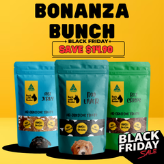 Three packages of dog treats with a Black Friday sale label on a yellow background Save $14.90