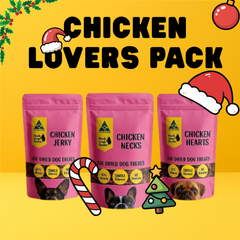 Three pink packages of 'Chicken Lovers Pack' dog treats from Bark with Buster on a yellow background with Christmas decorations.