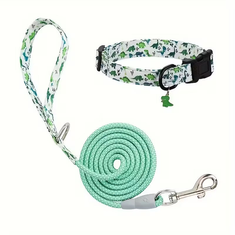 Dog collar and leash set with green and white dinosaur pattern on a white background