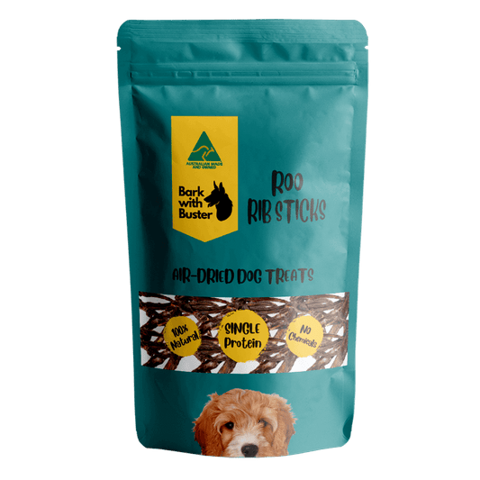 Kangaroo Rib Sticks Dog Treats in a teal bag with a puppy image, air-dried and 100% natural ingredients.