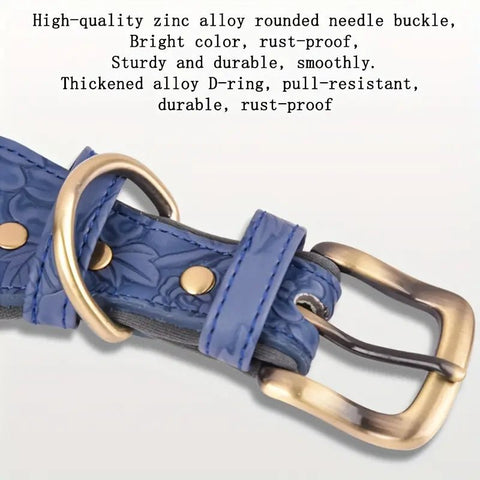 Close-up of durable embossed blue leather dog collar showing printed detail and gold buckle