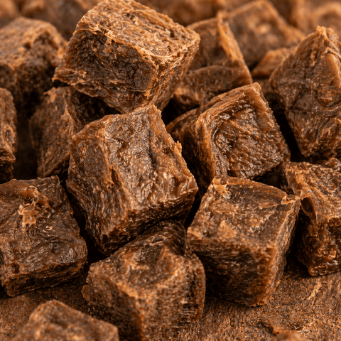 Close up of Bark with Buster Lamb Cube Dog Treats showing natural texture and bite sized training reward pieces